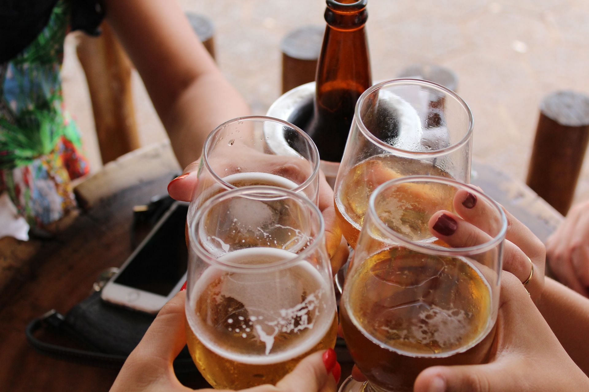 TikTokers are posting videos of showering in beer. (Image via Unsplash/ Giovanna Gomes)